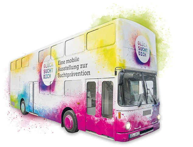 Bunter Bus mit rosa-gelbem Farbverlauf, Aufschrift Glück sucht Dich und Eine mobile Ausstellung zur Suchtprävention auf weißem Hintergrund.