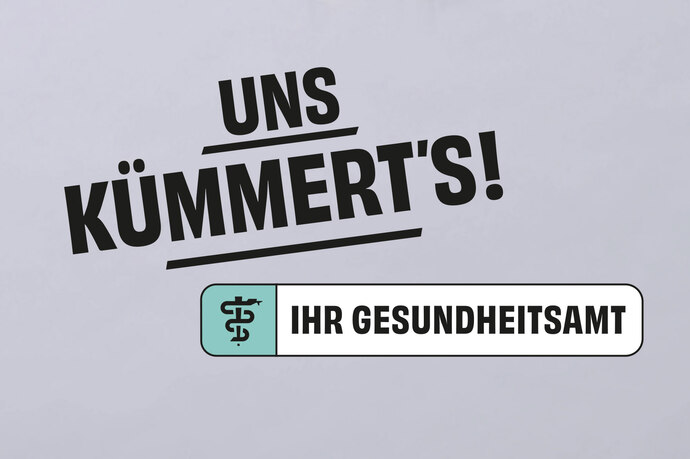 Text vor grauem Hintergrund: Uns kümmert's! Ihr Gesundheitsamt